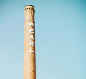 the pearl tower in front of a light blue sky